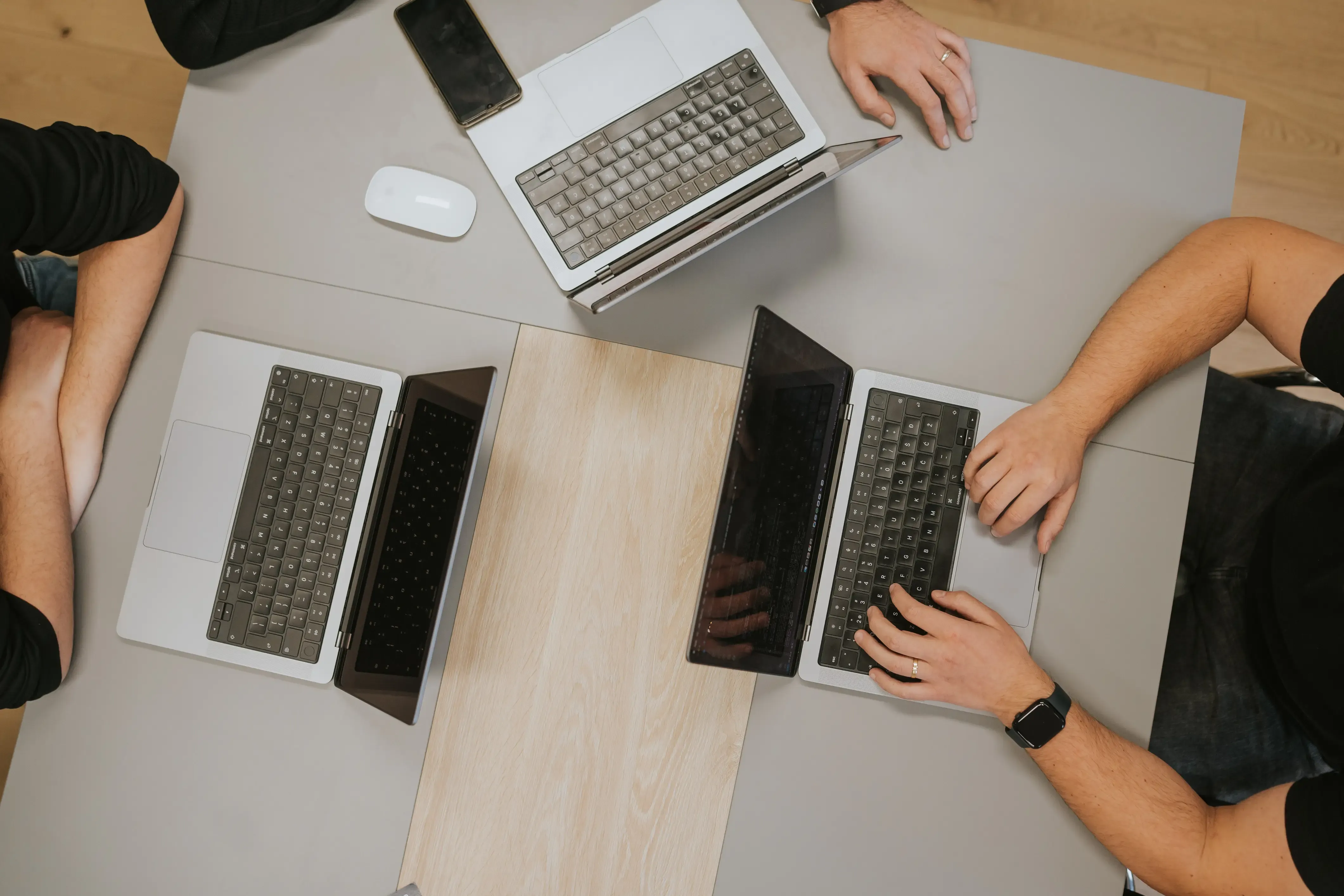 Team working together with laptops