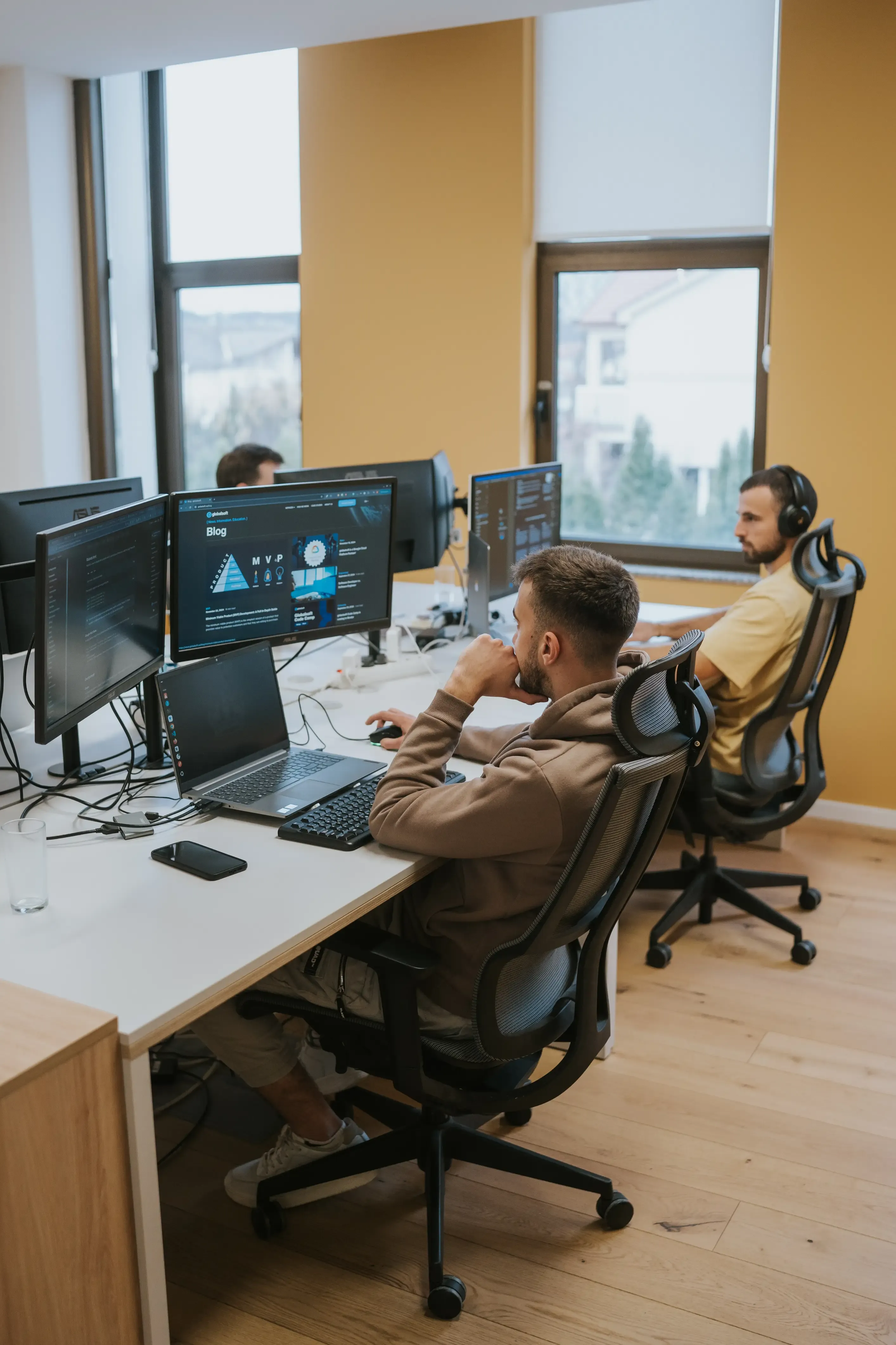 Design team working at their workstations